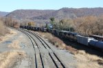 NS 6930 leads train 35A out of Enola yard while H15 couples the rest of its train alongside